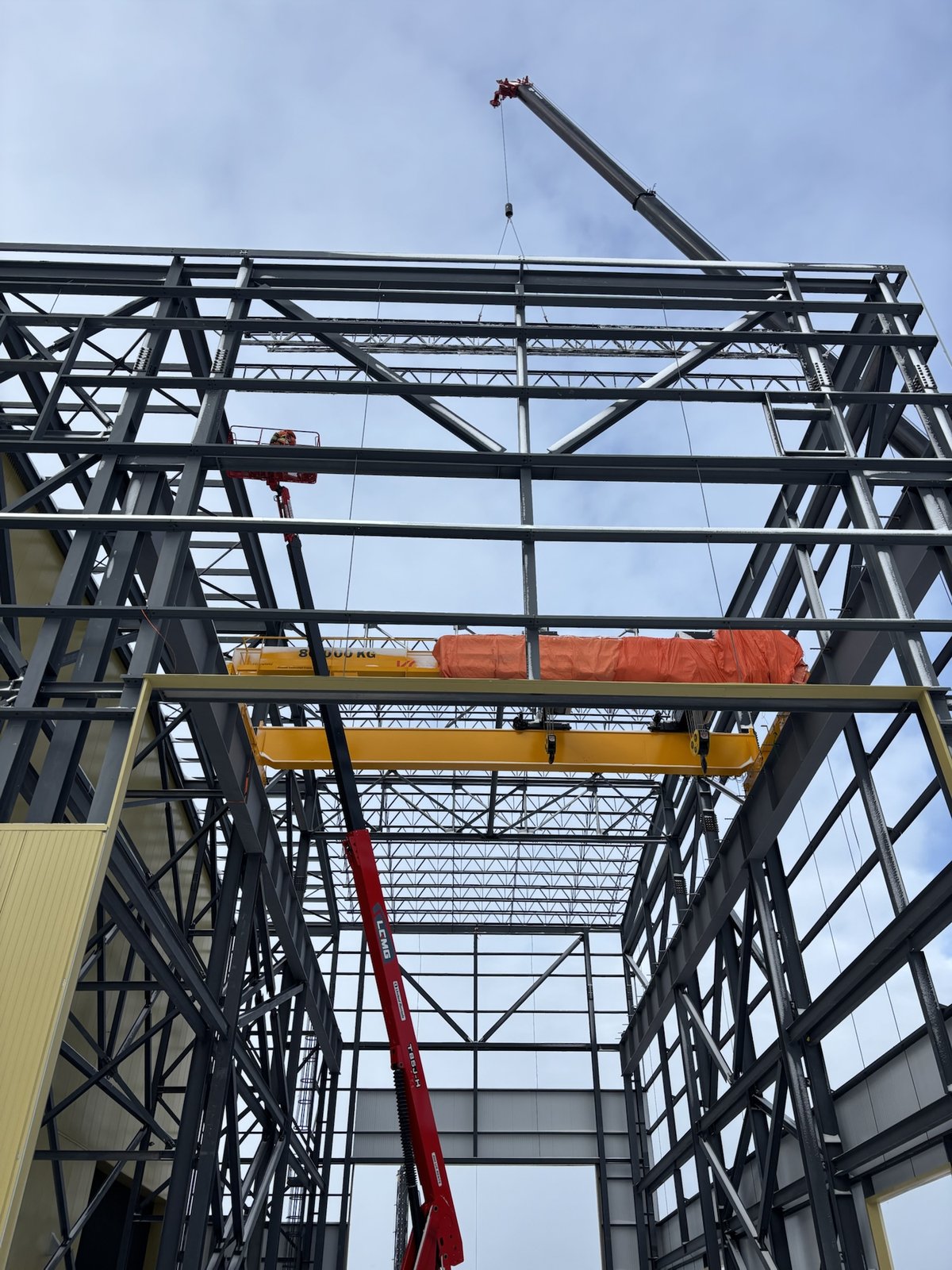 Crane lifting steel frame